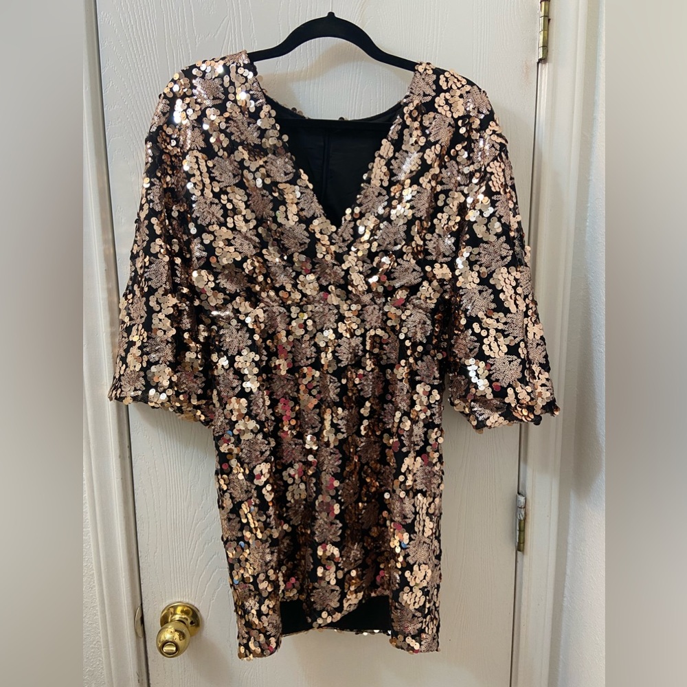 Rose gold sequence dress. zipper intact no tears